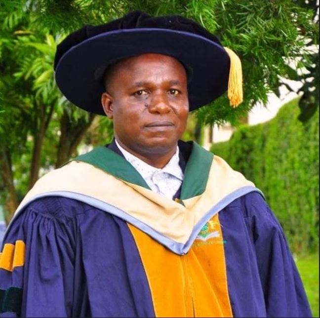 National Registration Bureau Boss Graduates With PhD